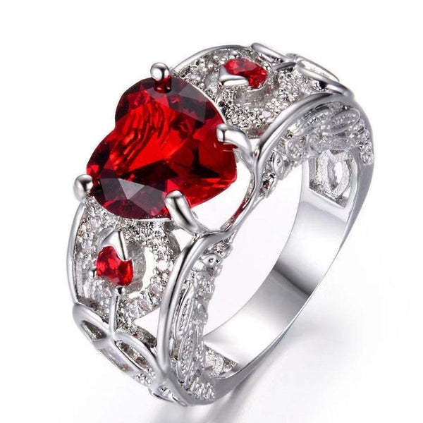 Silver Ring with Heart and Ruby Design